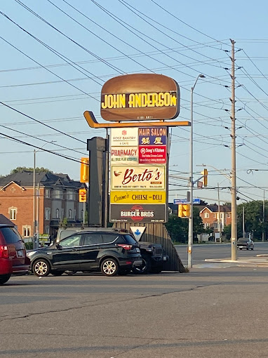 John Anderson Charcoal Broil Hamburgers